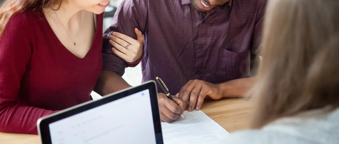 Interracial-couple-signing-papers